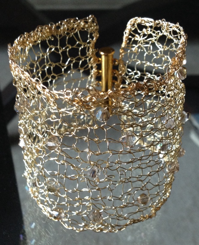 photogal/gold knitted cuf with swarovski crystals.jpg